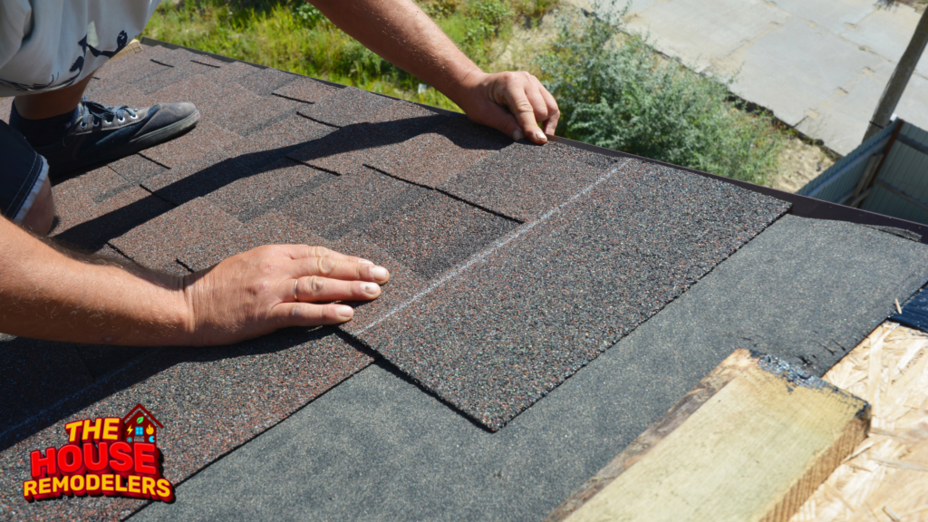 man installing roofing sheets